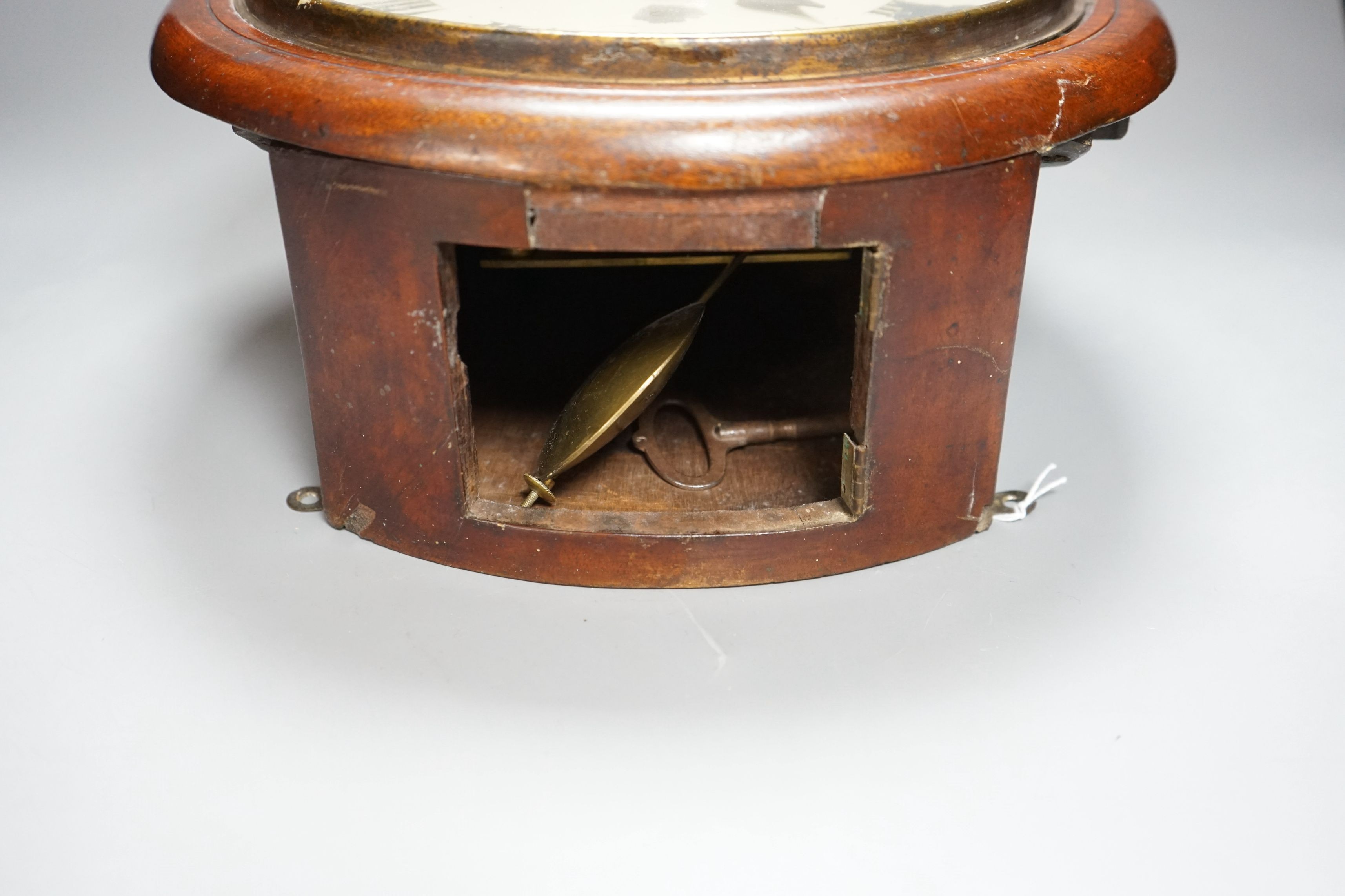 A Victorian single fusee wall timepiece, dial marked Dovey Whetstone, 32cm high